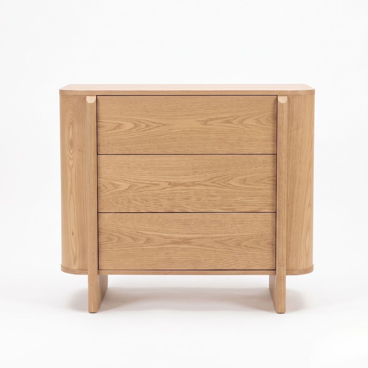 Wooden three-drawer dresser on a white background