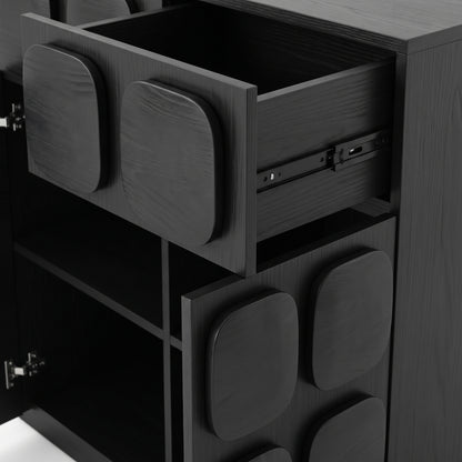 Close-up of a black cabinet drawer section with one drawer open