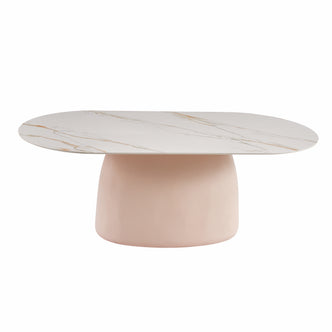 Contemporary oval coffee table with white marble-effect top and blush pink base on white background