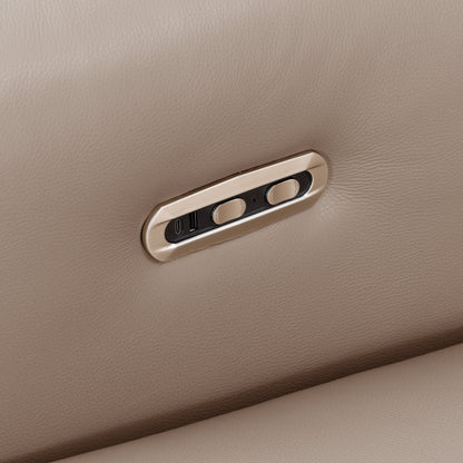 Close-up of reclining sofa control buttons in taupe upholstery