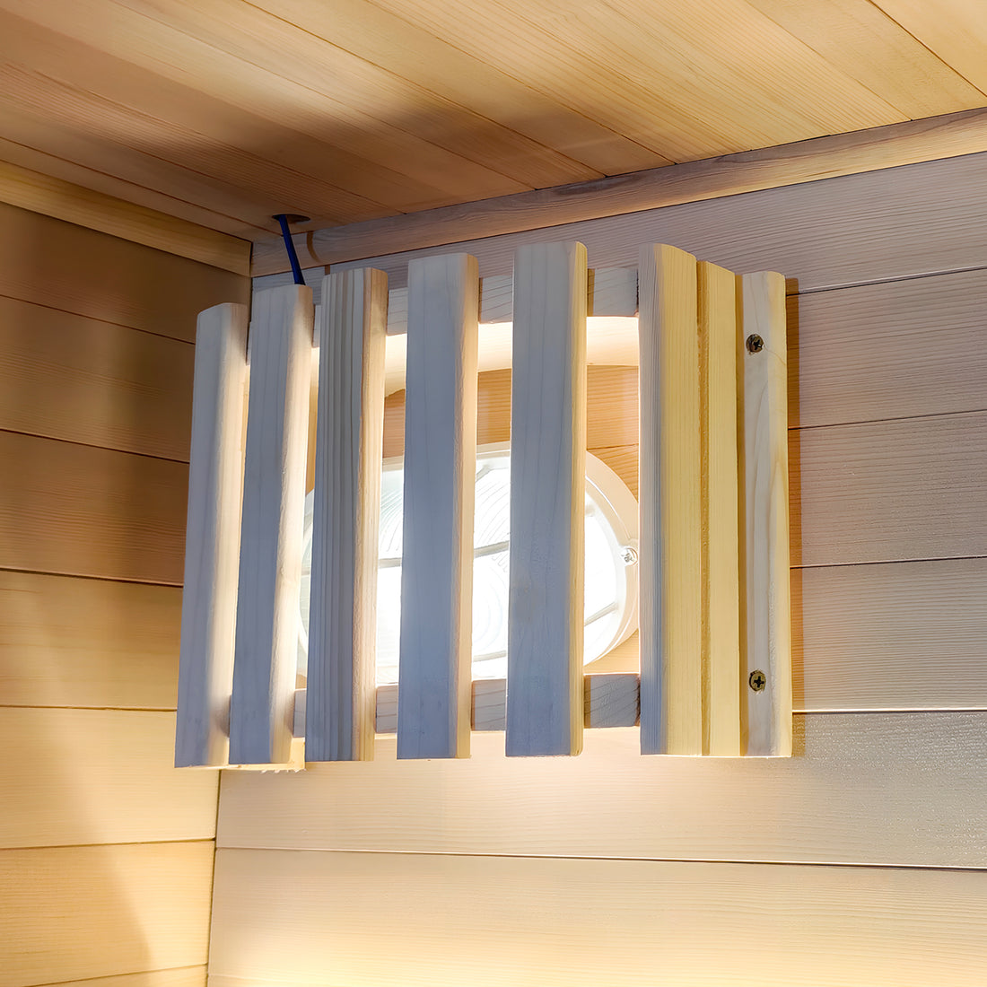 Wooden wall-mounted light fixture in a wooden room