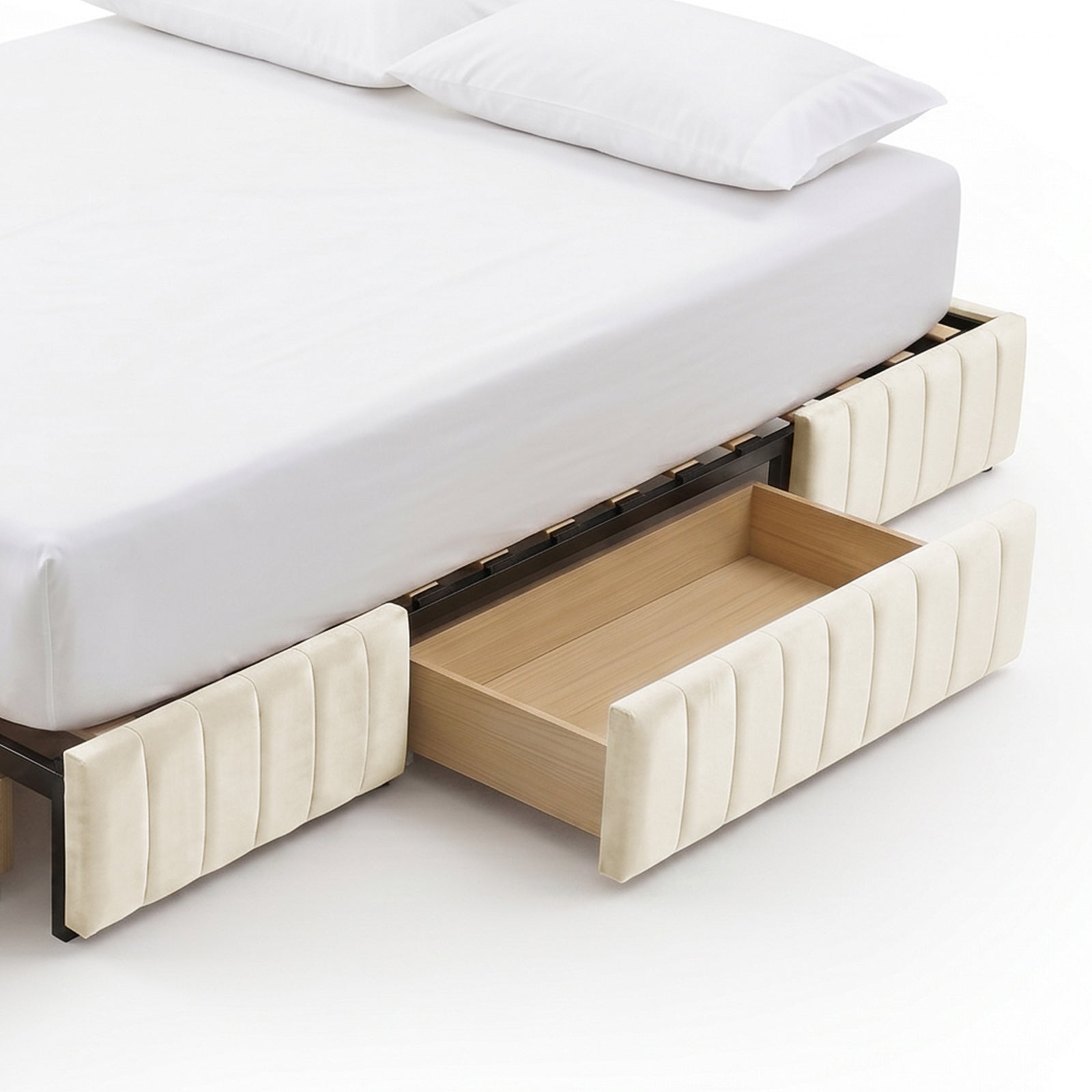Partial view of upholstered bed with under-bed storage drawers on white background