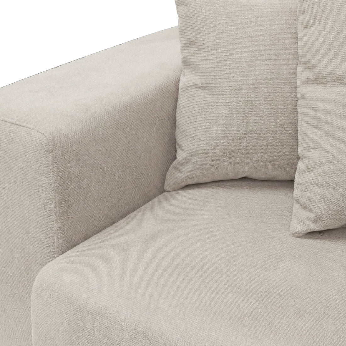 Close-up of sofa seat and armrest on white background