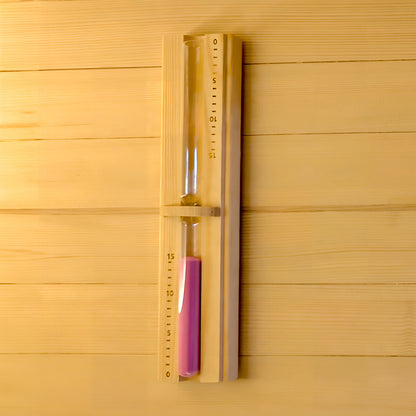 Vertical wooden sauna sand timer mounted on a wooden wall