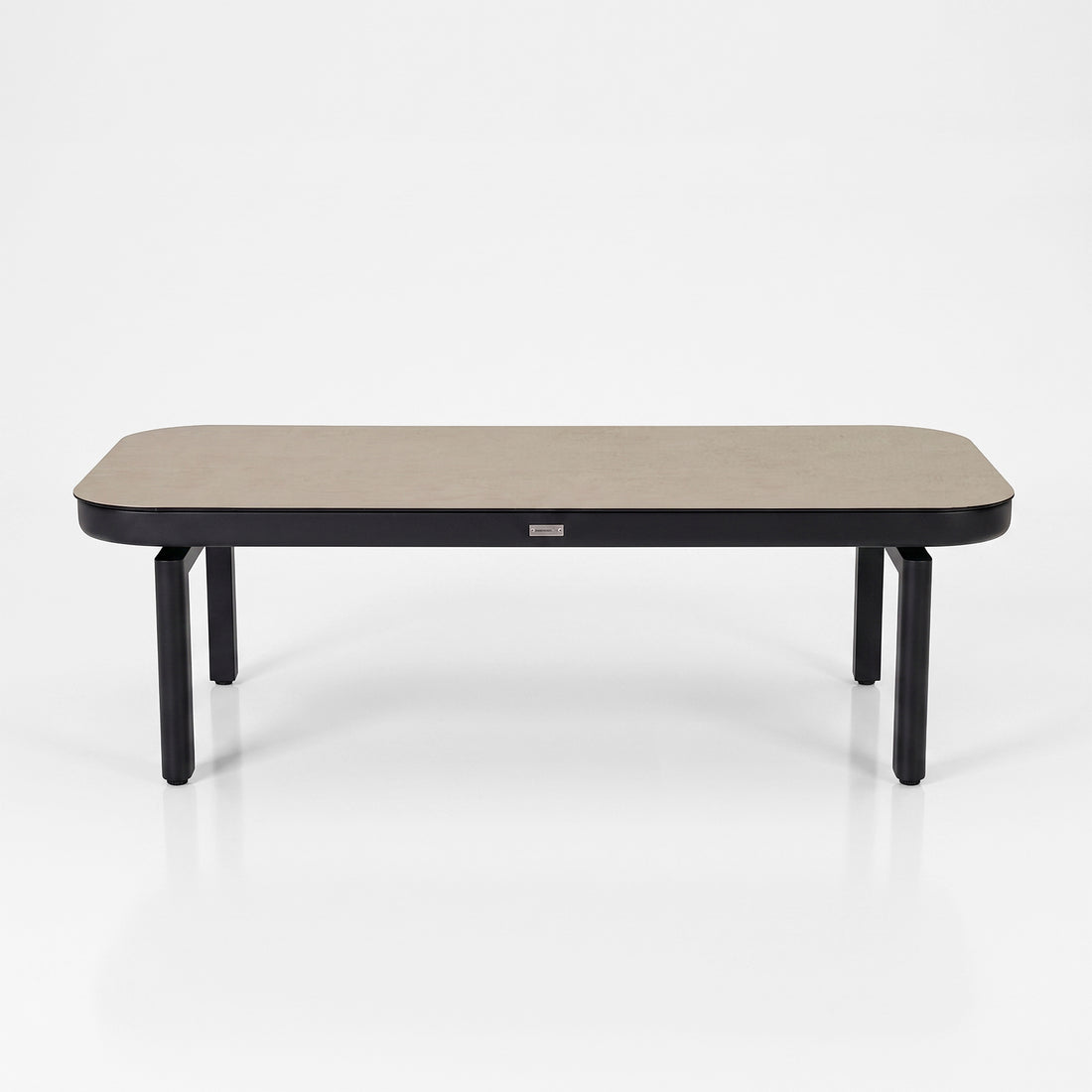 Rectangular table with rounded edges on white background.
