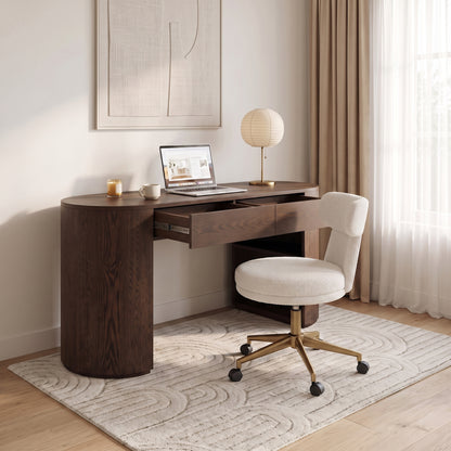 Dark wood desk with matching chair styled in a modern home office room