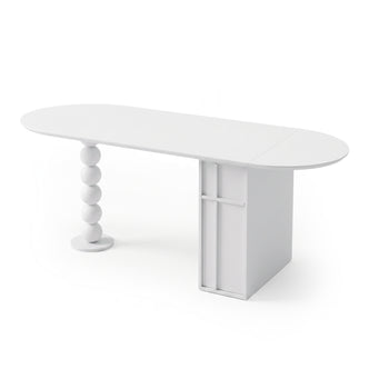 White modern oval table with a geometric pillar leg and stacked sphere leg on a white background