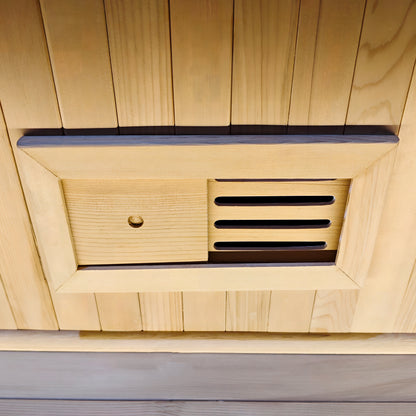 Close-up of a wooden vent or air intake panel