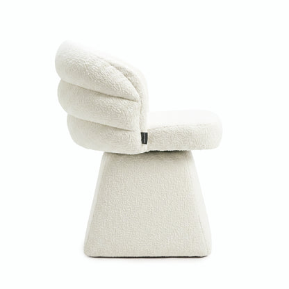 Side view of a modern white upholstered chair on a white background.