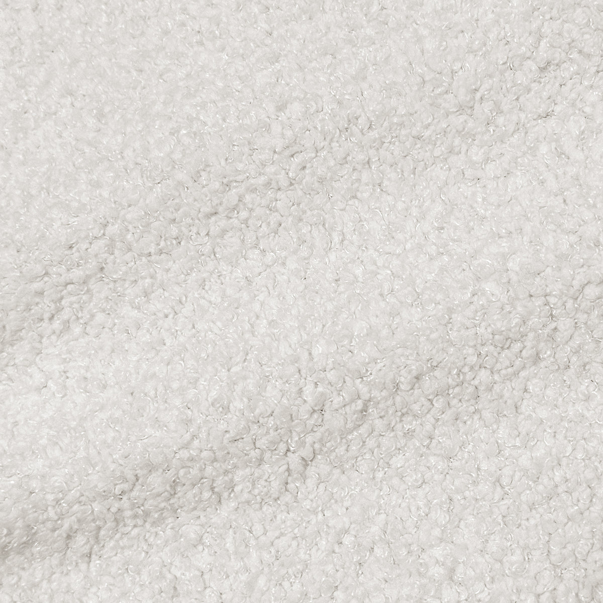 Close-up of white textured sherpa-like fabric