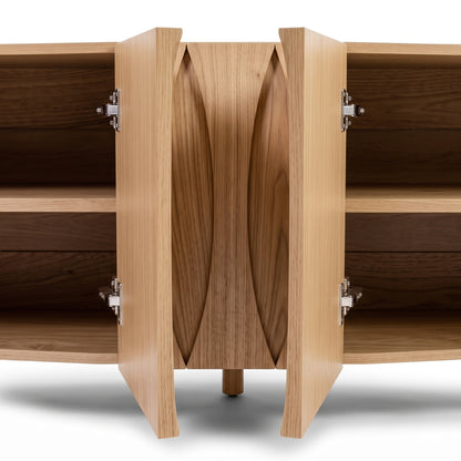 Close-up of wooden cabinet interior with open doors and shelves