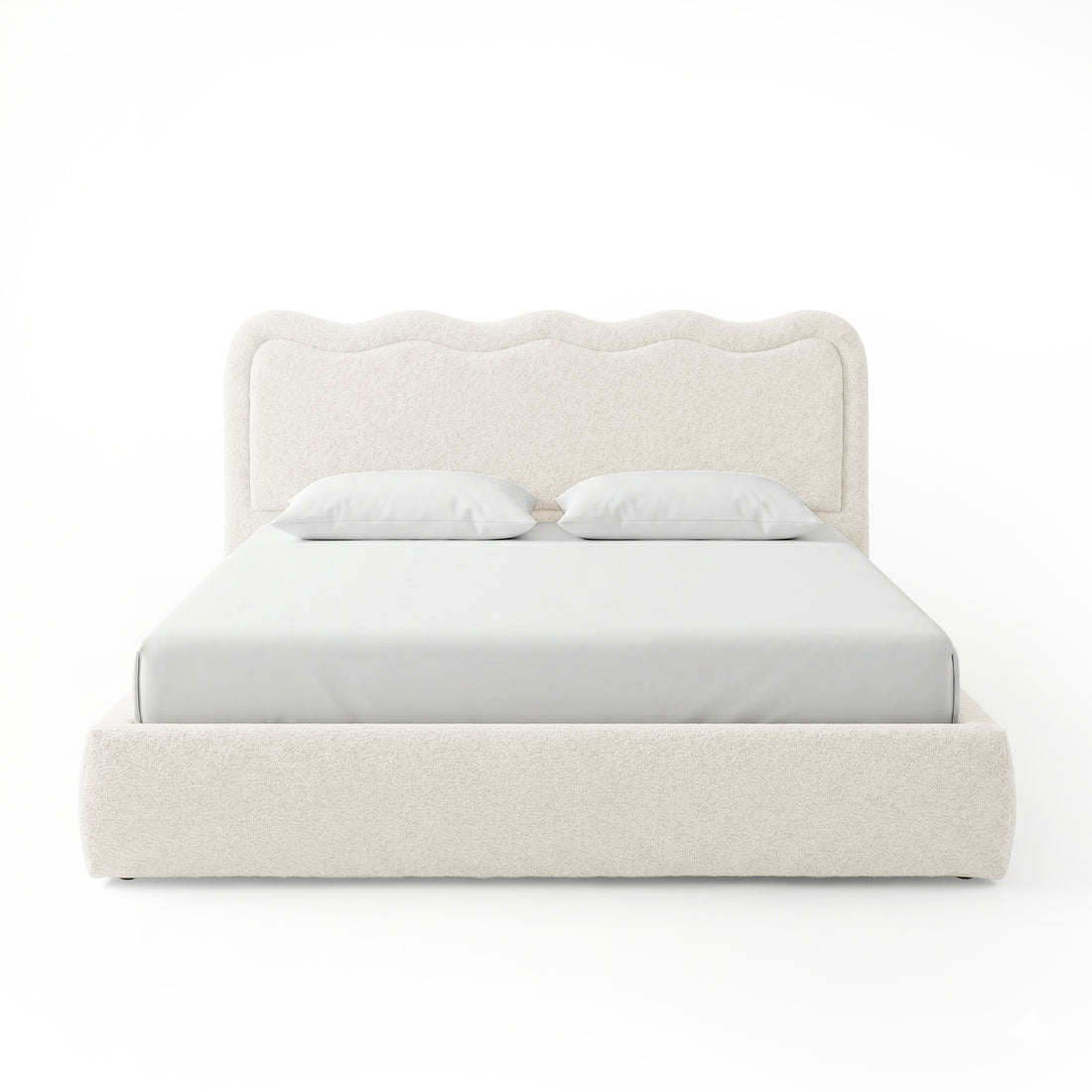 Front-facing upholstered bed with scalloped headboard on white background
