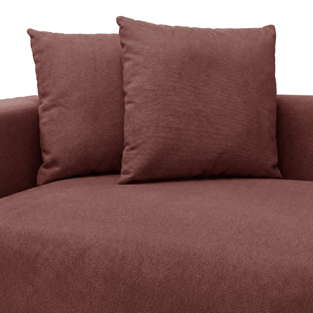Close-up of brown sofa fabric and cushions on white
