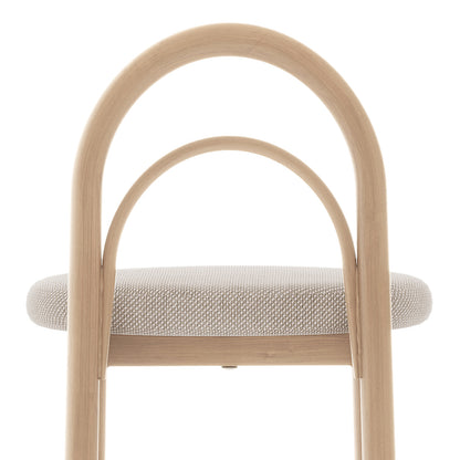 Close-up of the upper backrest and seat of a chair on white background.