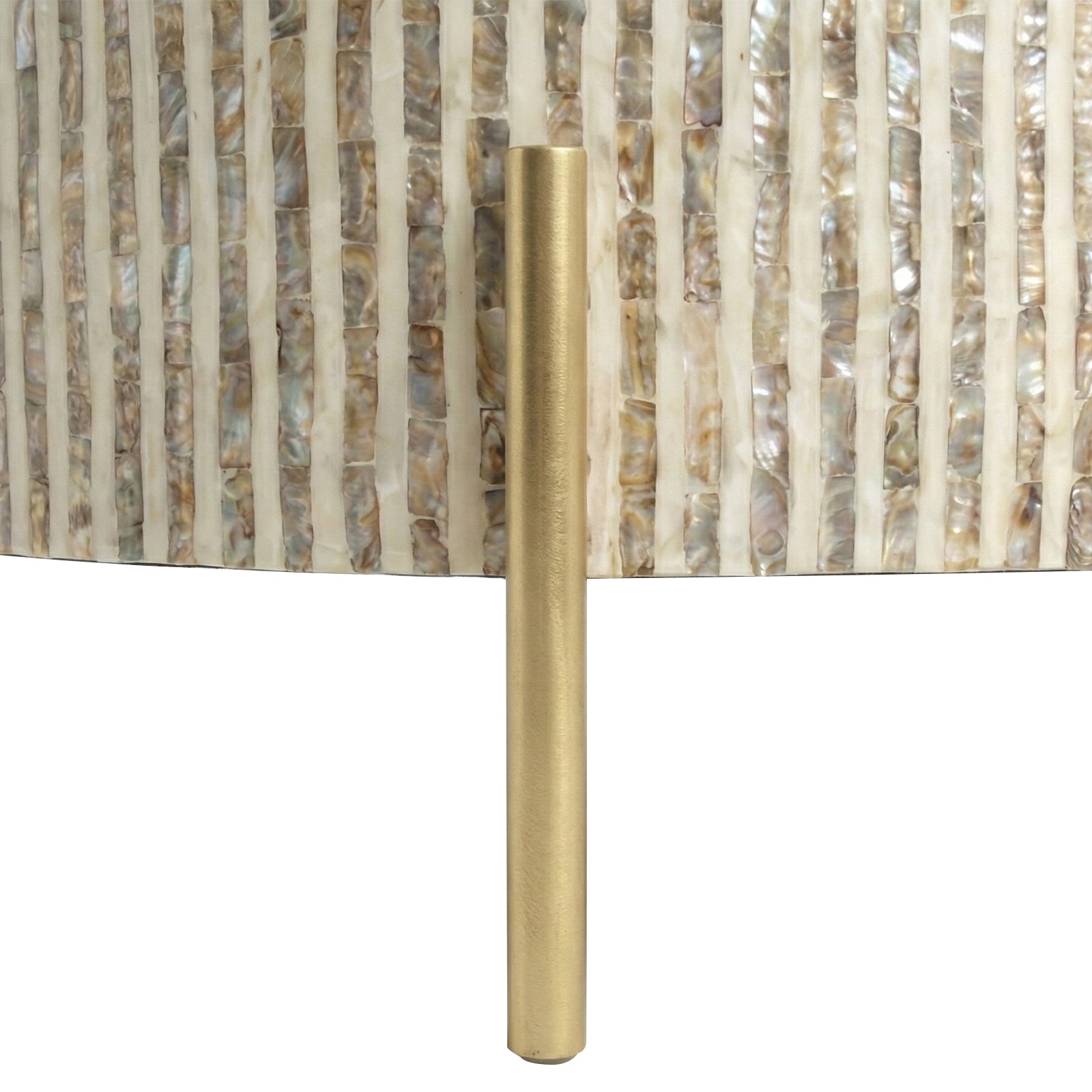 Close-up of textured iridescent surface detail and gold metal rod on white background