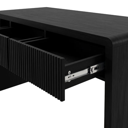 Close-up of a black desk drawer partially open