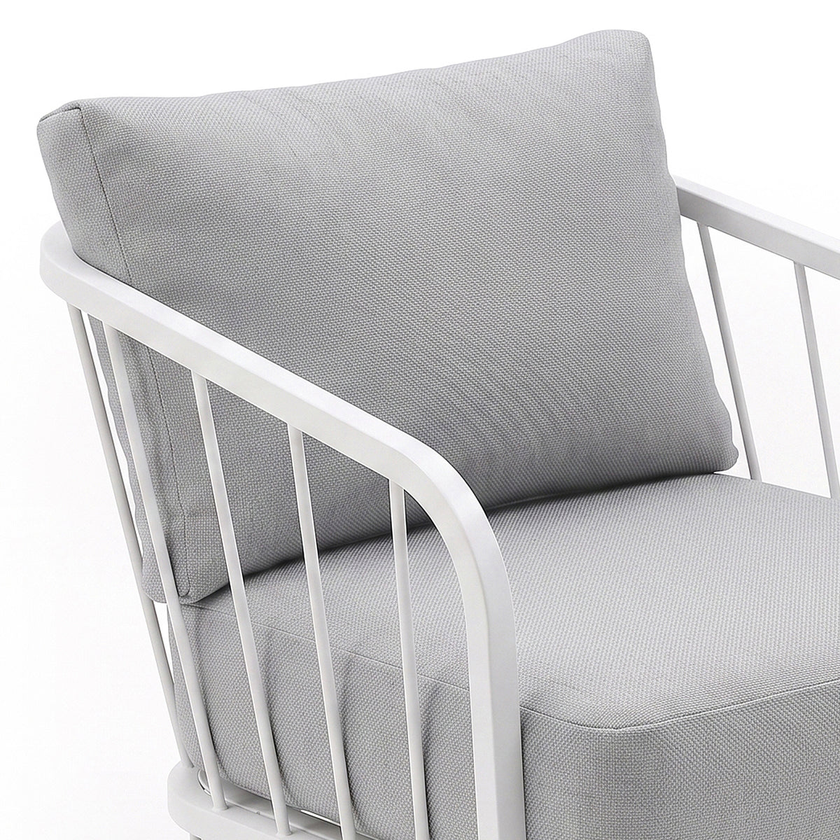 Close-up of a chair seat and back with white metal frame on a white background