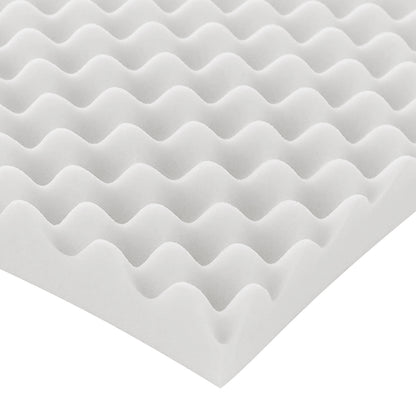 White egg-crate foam pad close-up on white background