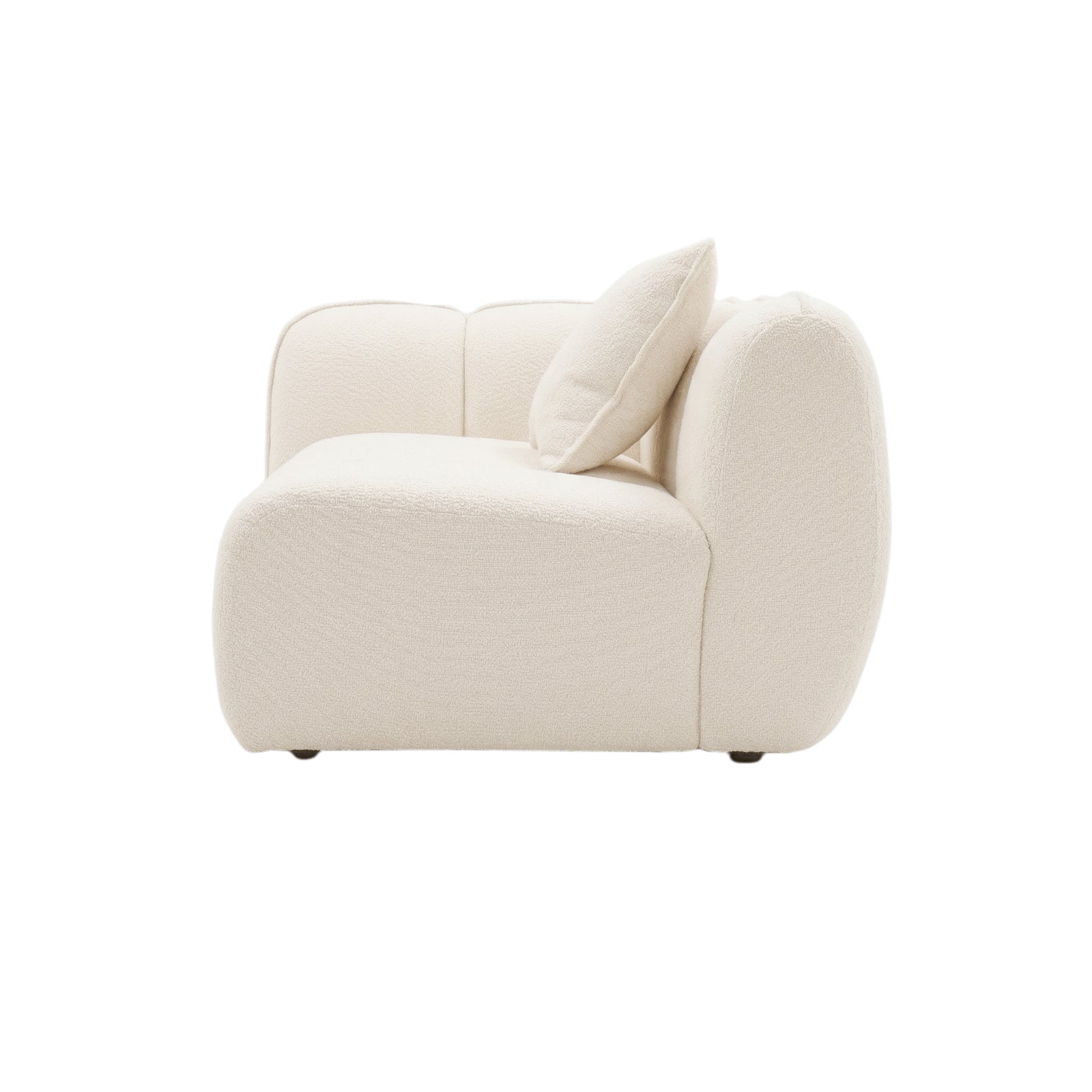 Side view of a cream upholstered sectional sofa section on white background