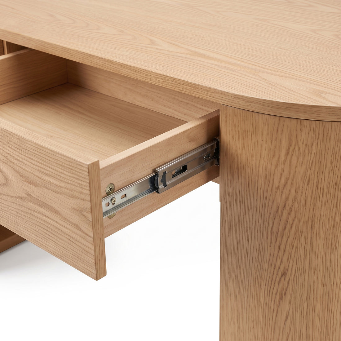 Close-up of a wooden desk drawer on white background