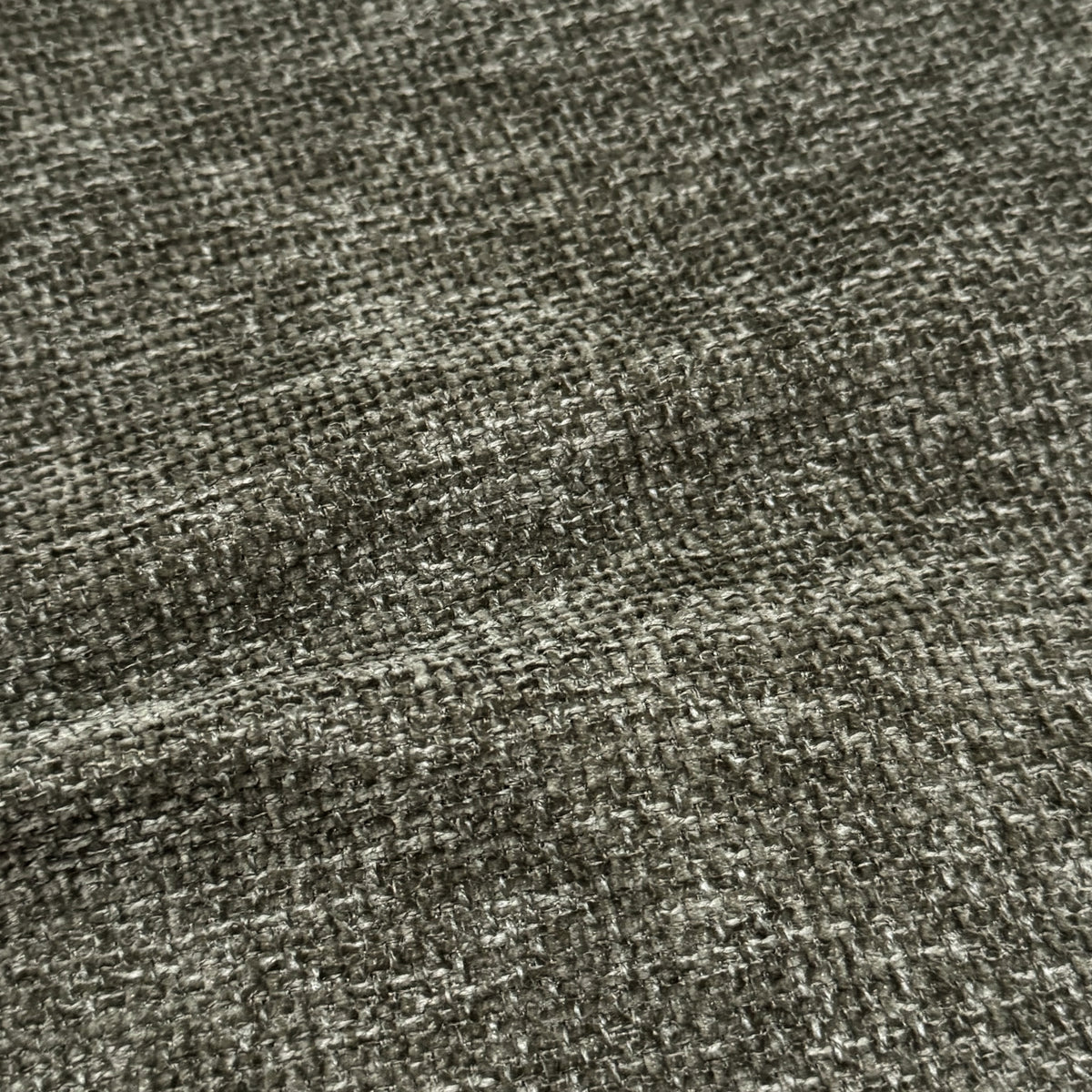 Close-up of moss green woven fabric texture