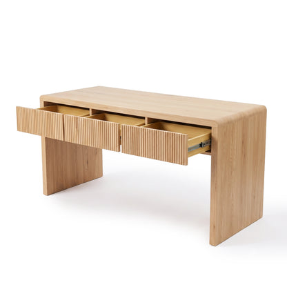 Modern wooden desk with curved edges and three partially open drawers on a white background.