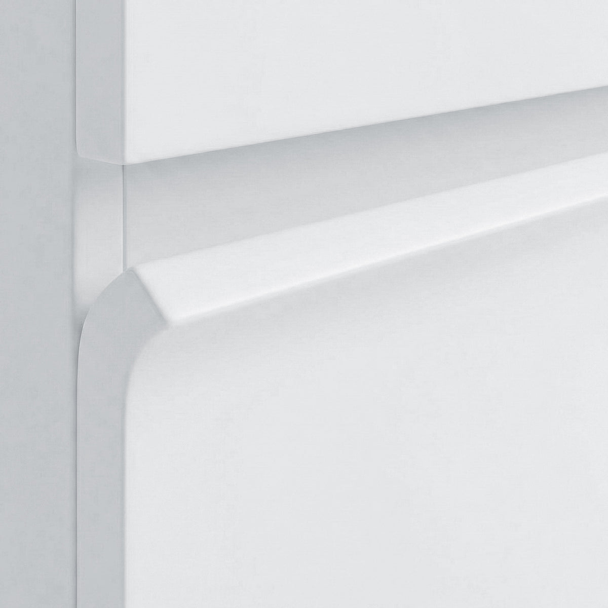Close-up of cabinet corner and smooth white finish