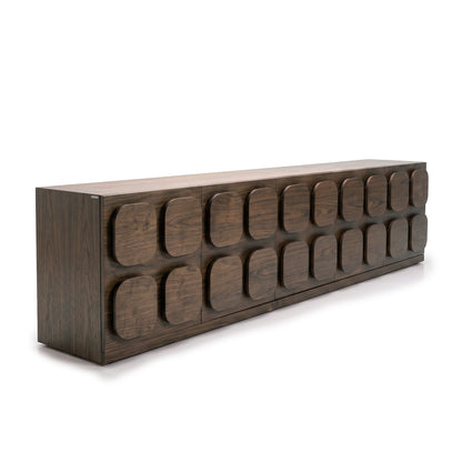 Dark wood sideboard with geometric front panels on a white background
