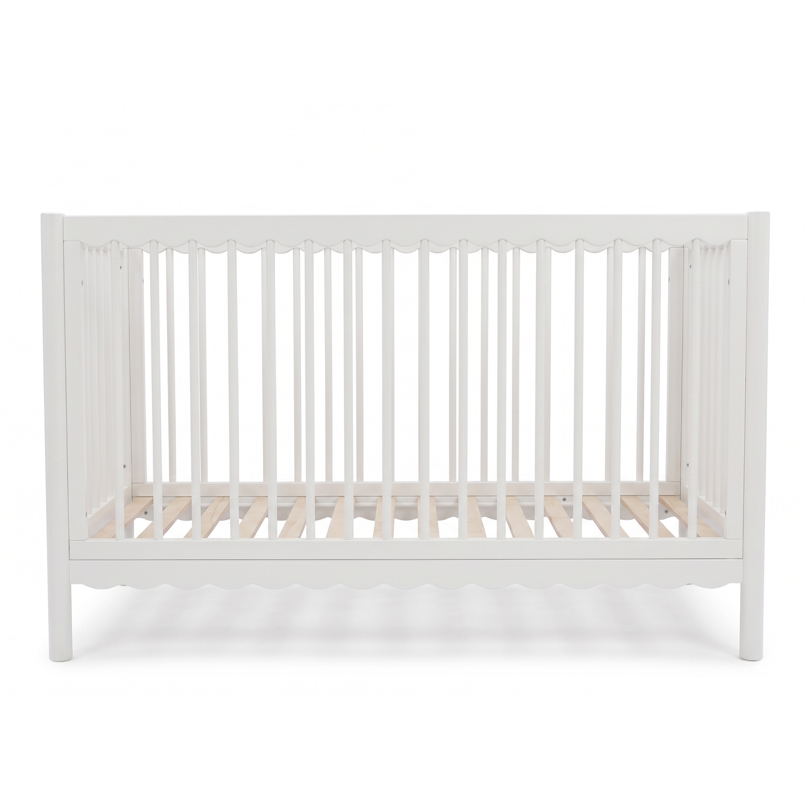 White baby crib with slatted sides on a white background