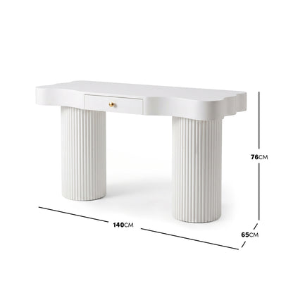 White modern desk with scalloped top and fluted legs shown with dimension measurements on a white background