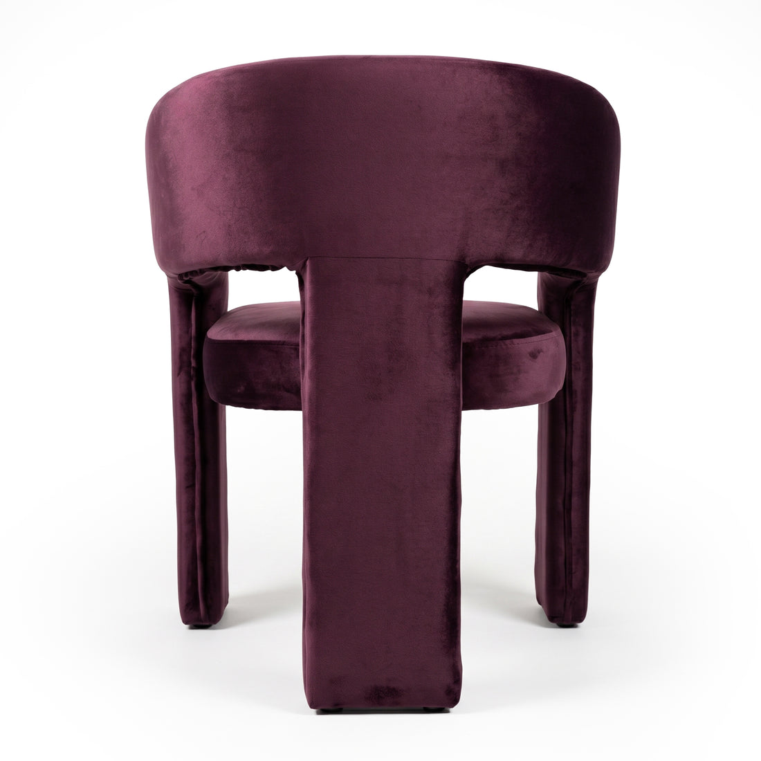 Back view of full plum velvet chair on white background