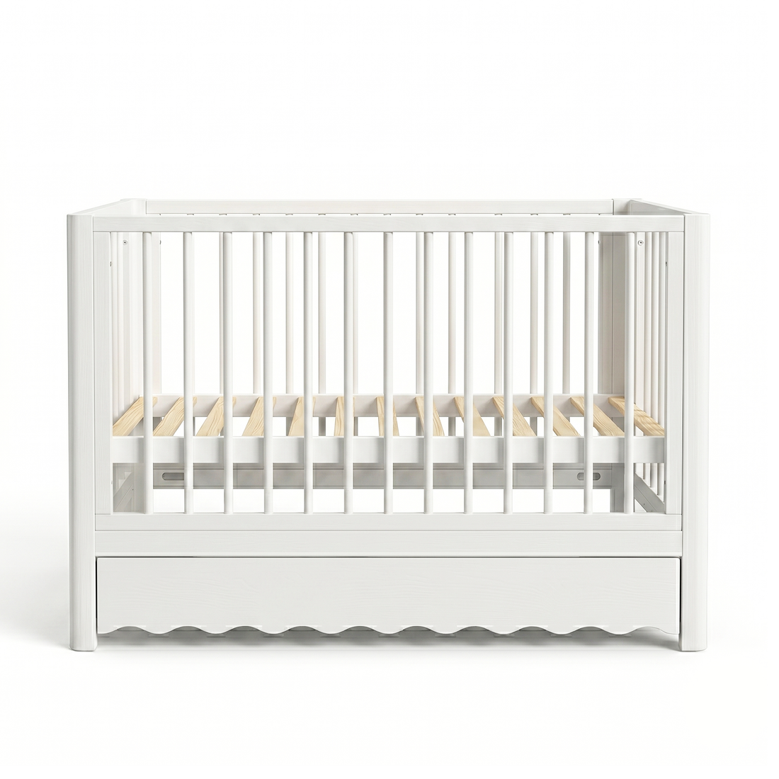 White crib on white background with slatted sides and visible wooden mattress support