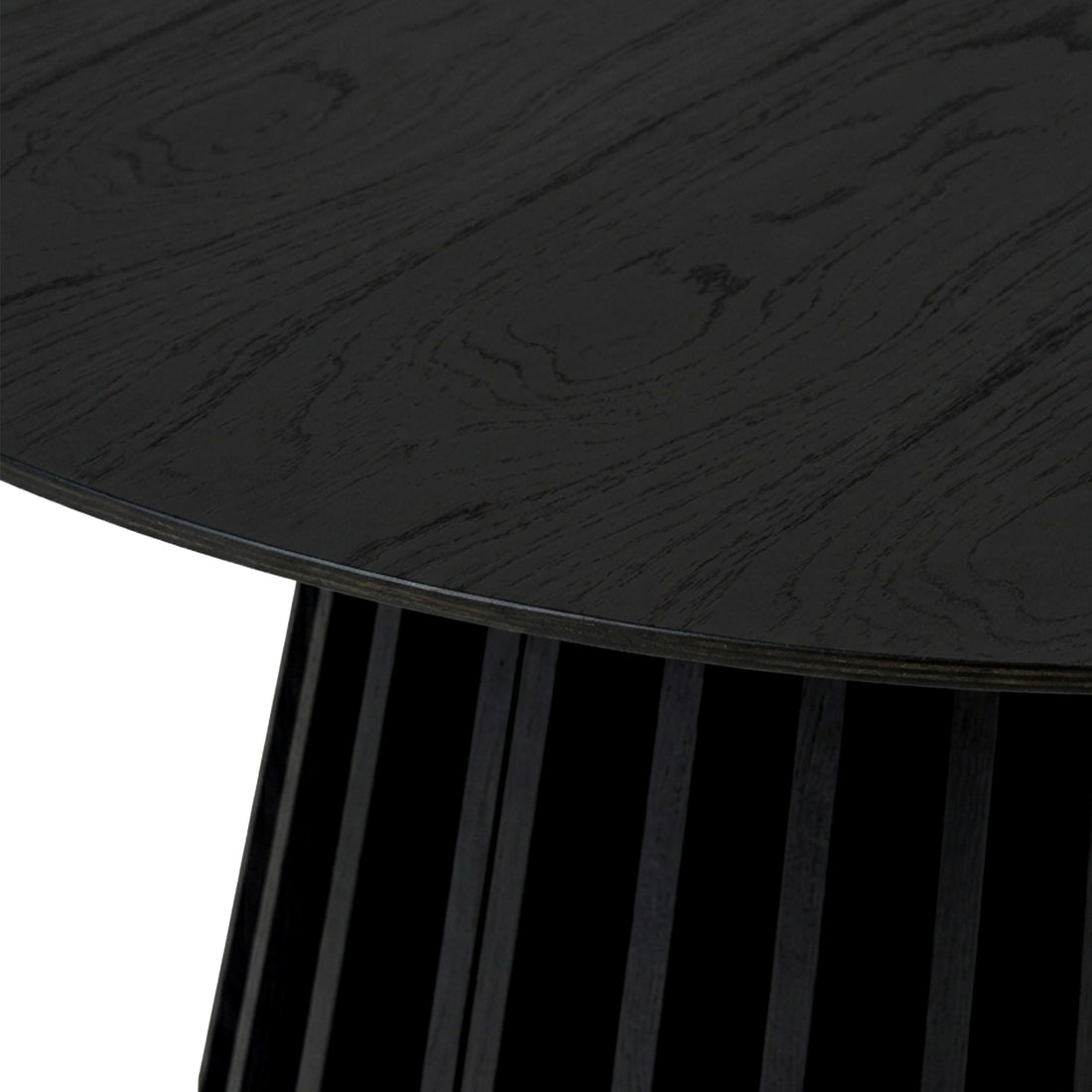 Close-up of dark wood tabletop edge and slatted base detail