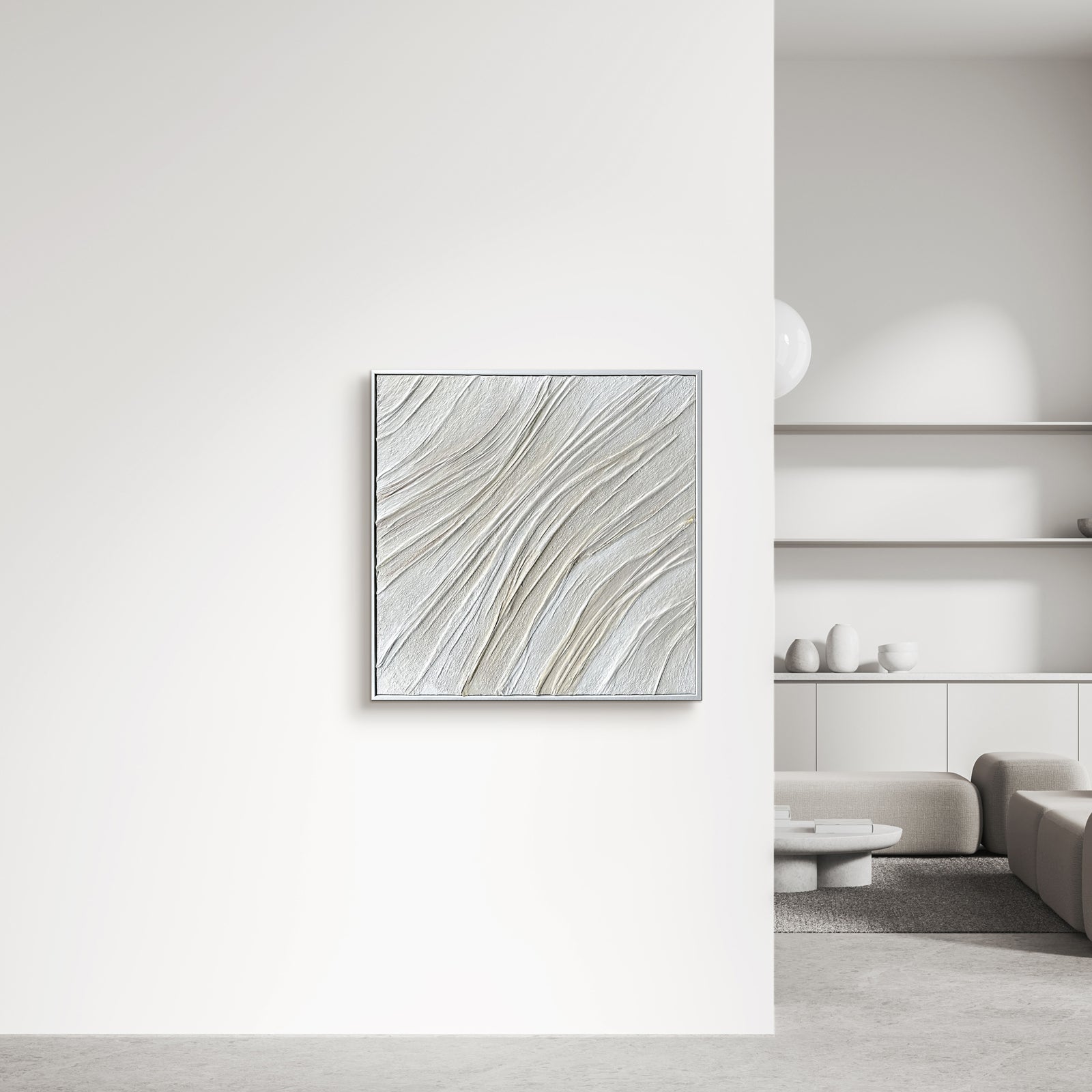 Anya Canvas Wall Art 105 x 105cm in White features wave-like textured strokes, providing a minimalist yet striking focal point on a white wall, complementing a serene, modern interior.