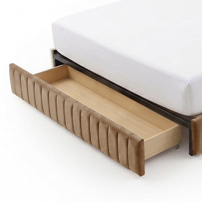 Under-bed storage drawer pulled out from beige upholstered bed base on white background