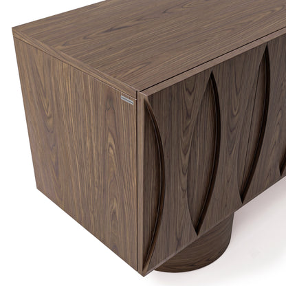 Walnut-colored sideboard on a white background with carved wavy front design