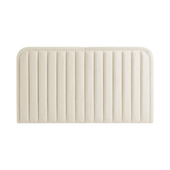 Cream upholstered headboard with vertical channels on white background