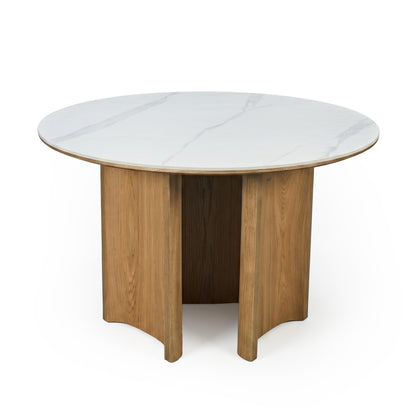 Round table with white marble-like top and wooden pedestal base on a white background