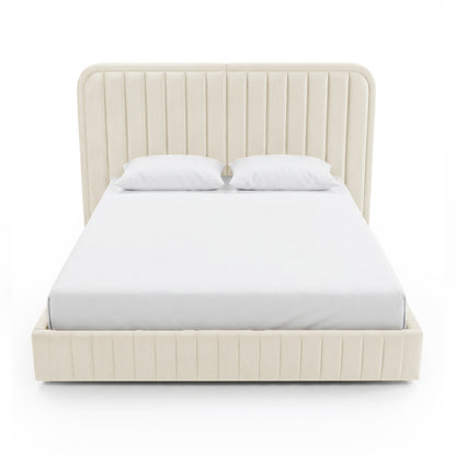 Cream upholstered bed frame with mattress and pillows on white background