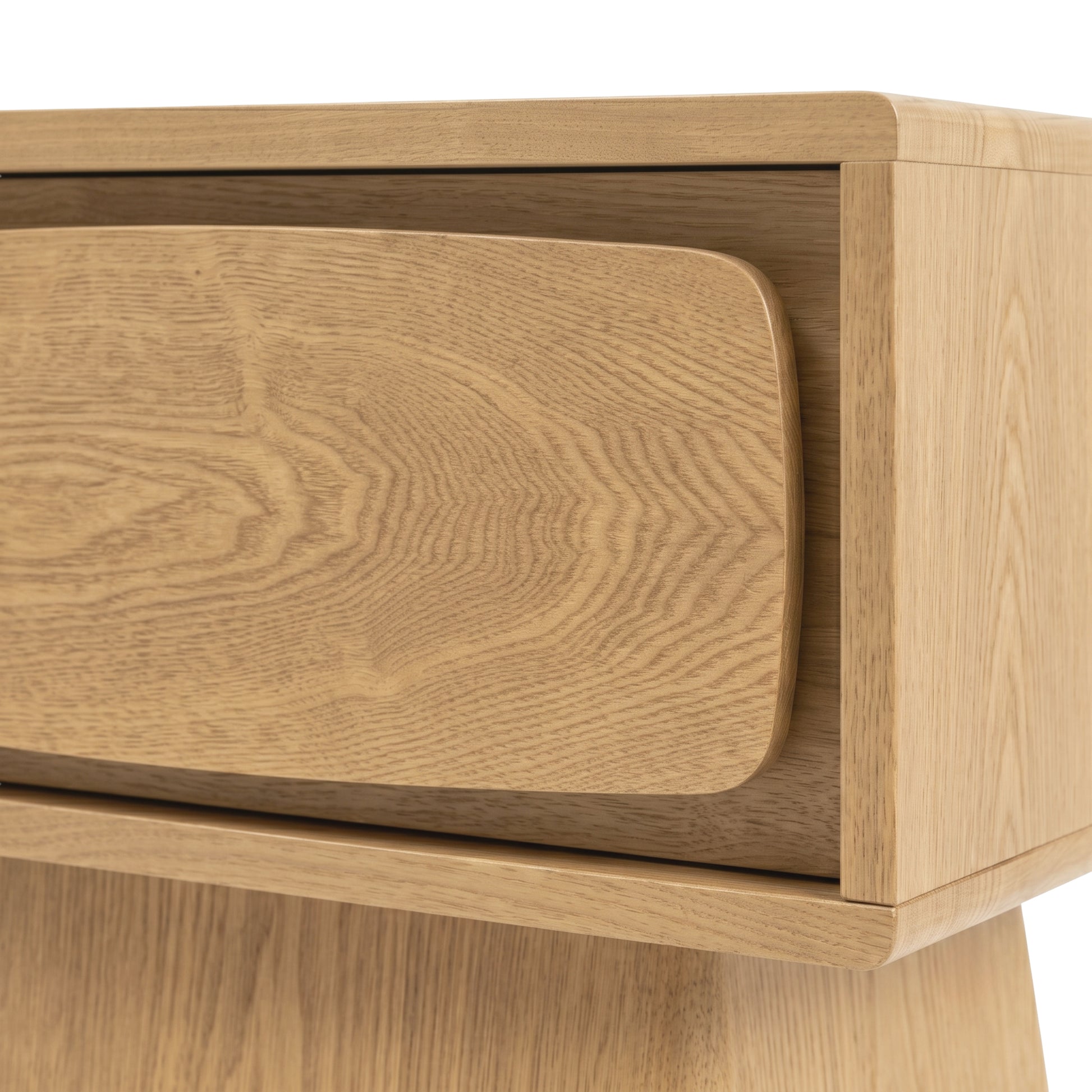 Close-up detail of the corner of a wooden furniture piece