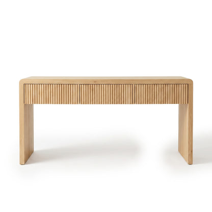 Minimalist wooden console table with vertical grooves on the front, shown full on a white background.