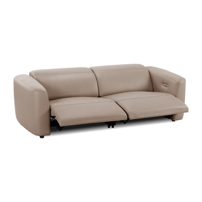Light beige reclining sofa with footrests extended on a white background