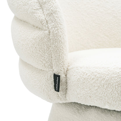Close-up of textured off-white chair upholstery on a white background.