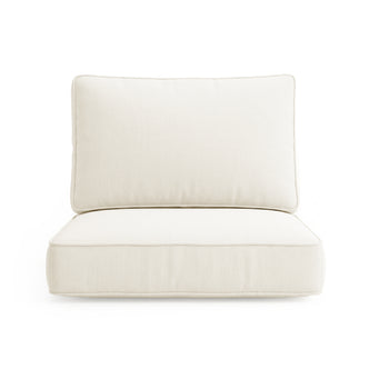 Close-up of Vernon Sofa Cushion Covers in Cream White, featuring two stacked off-white cushions with piped edges and a subtle woven texture, highlighting a clean, modern look for outdoor furniture.