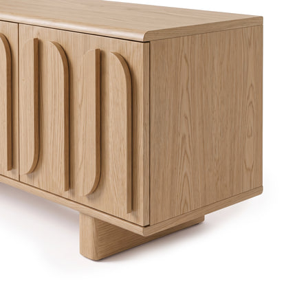 Modern light wood sideboard on a white background
