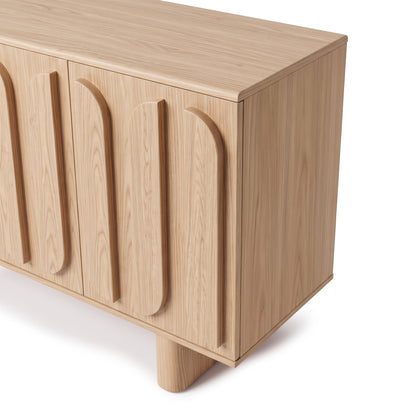 Light wood sideboard on white background with geometric door detailing, slightly cropped