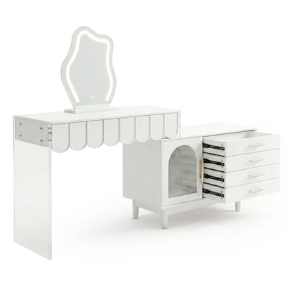 Studio shot of white vanity with decorative scalloped edge, asymmetrical mirror, and multi-drawer cabinet on white background