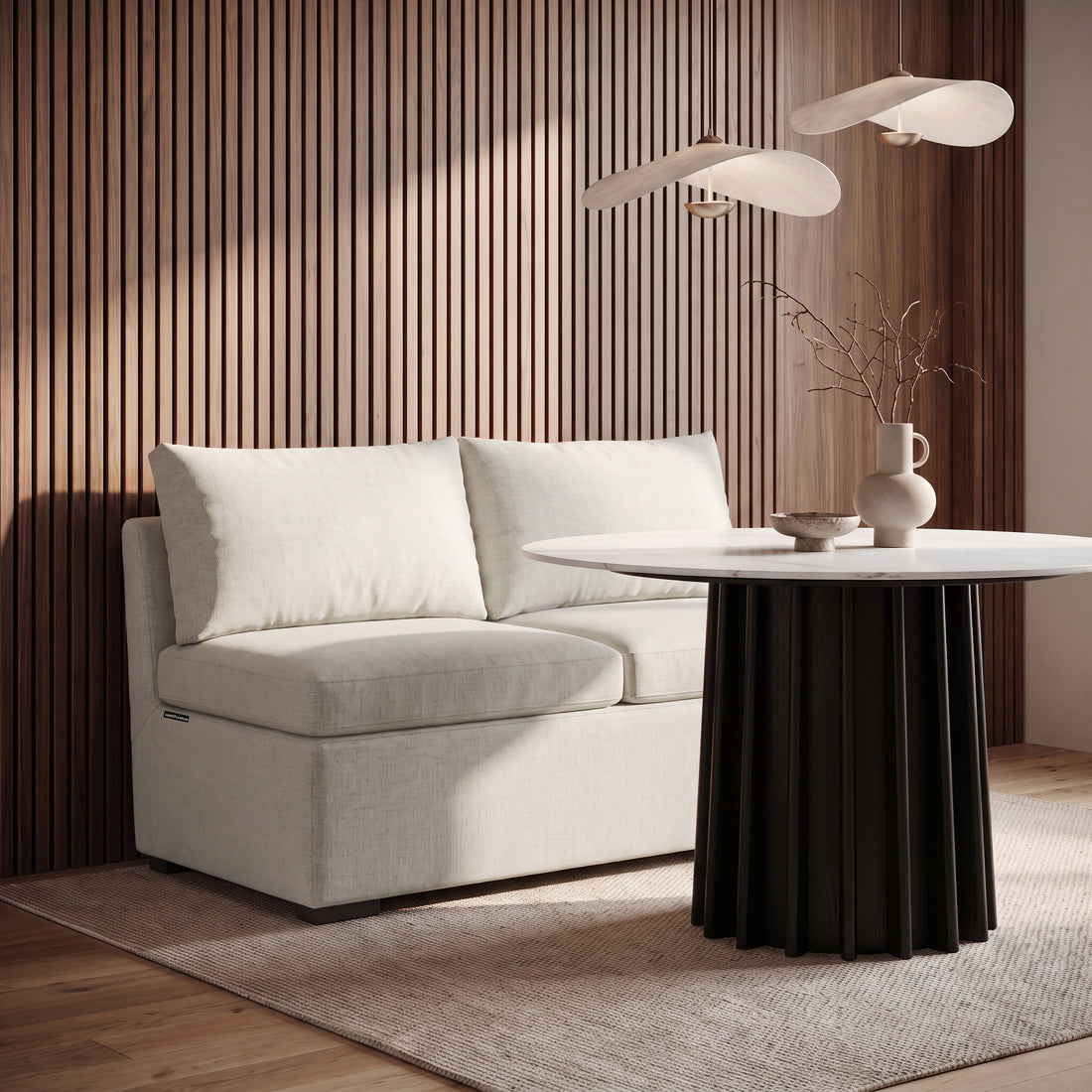 Cream bouclé sofa styled in a warm modern living room
