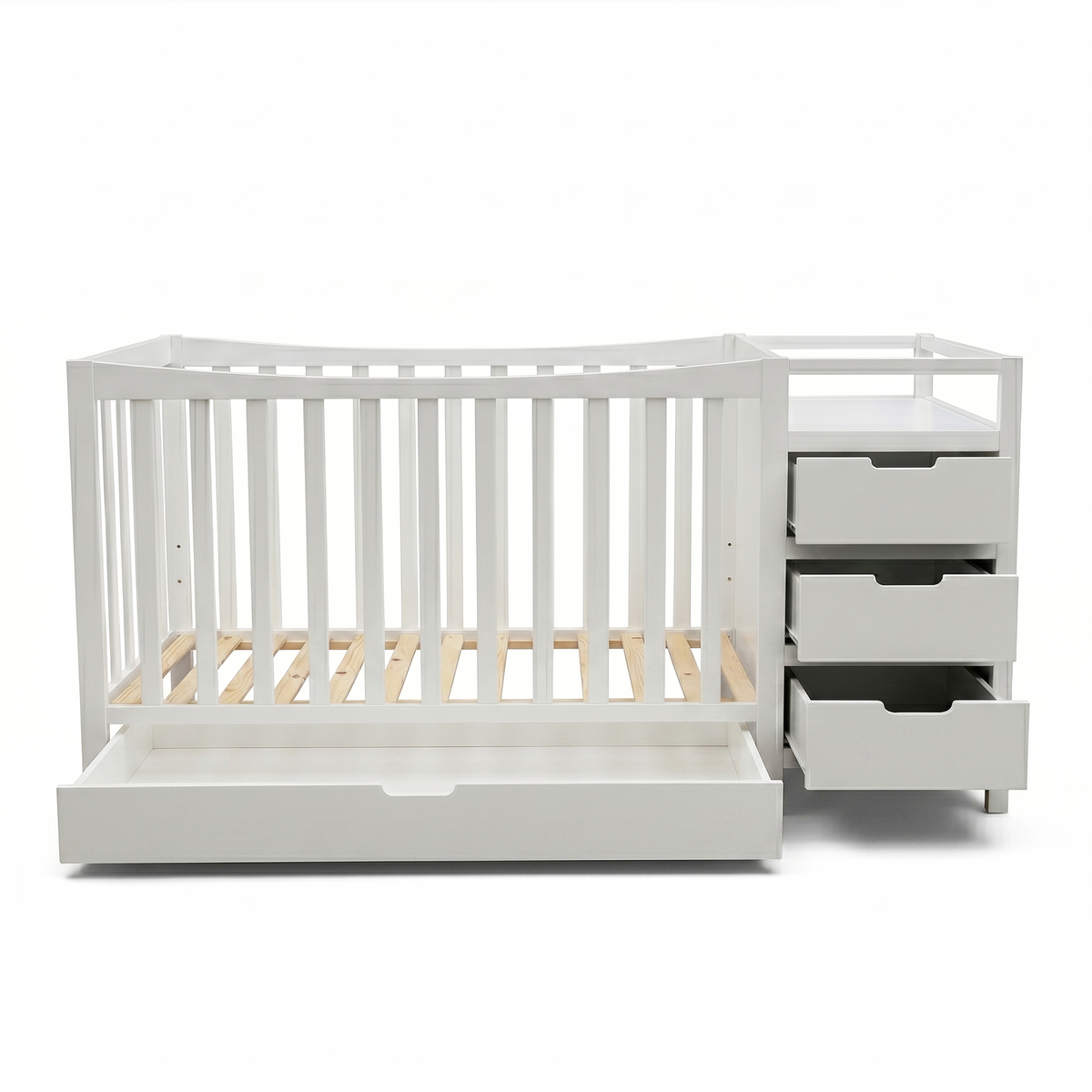 White baby crib with drawers and shelf on a white background