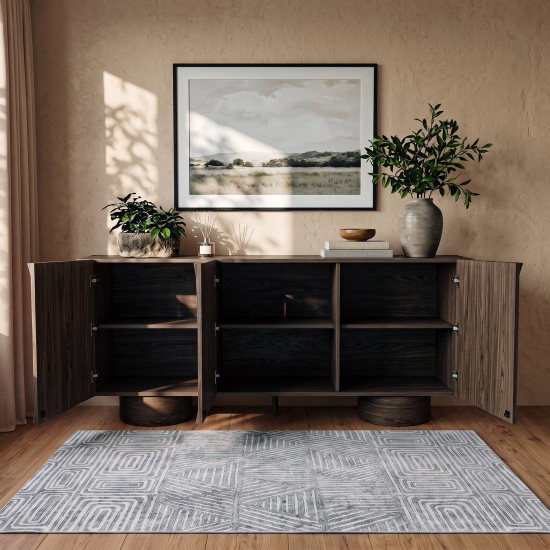 Open wooden sideboard in a styled living space showing interior shelves